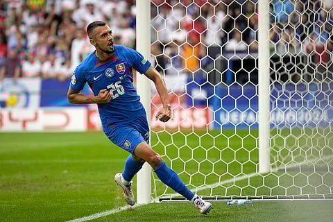 Ivan Schranz celebrates after scoring opening goal against England